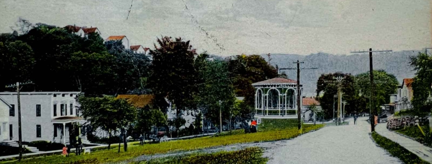 Old postcard image of Sheard Park looking north to south with an unpaved Furnace Street on the right.