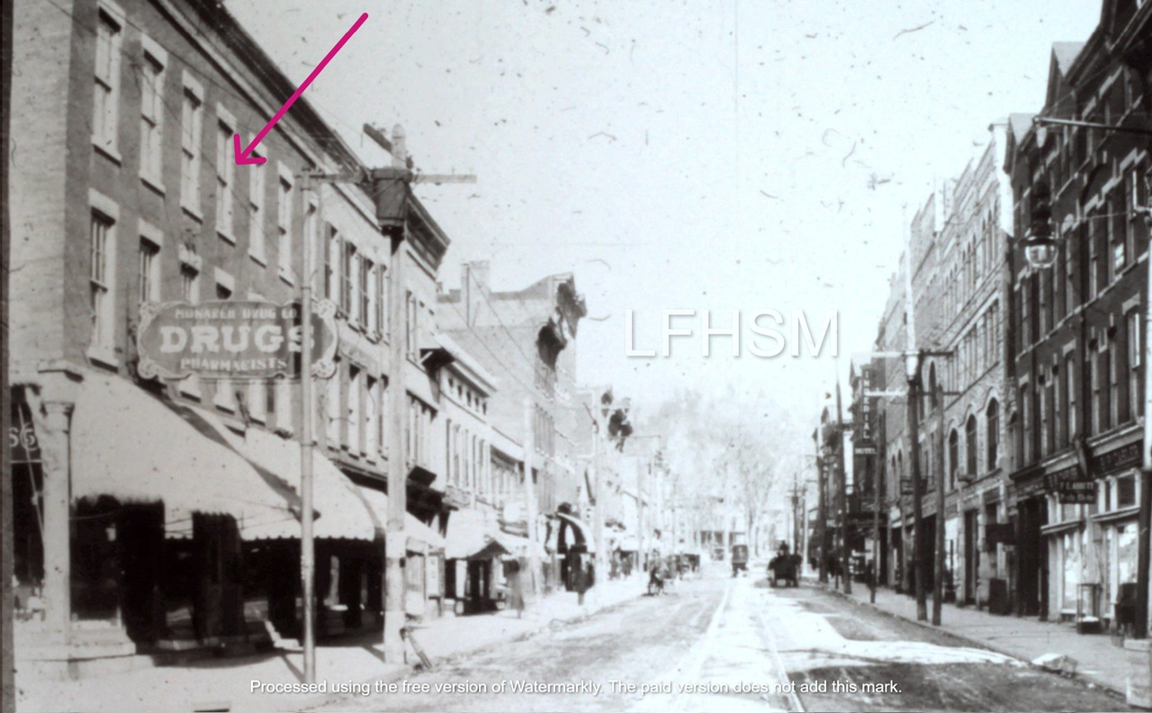 Red Arrow: 542-546 East Main Street | The Lansing - Fox Block | Was the location of William H. Bonnetts' Drug Store and the Confectionery of Louis & Leon Limbres in 1910, presently is the location of Ruggiero's Trattoria.