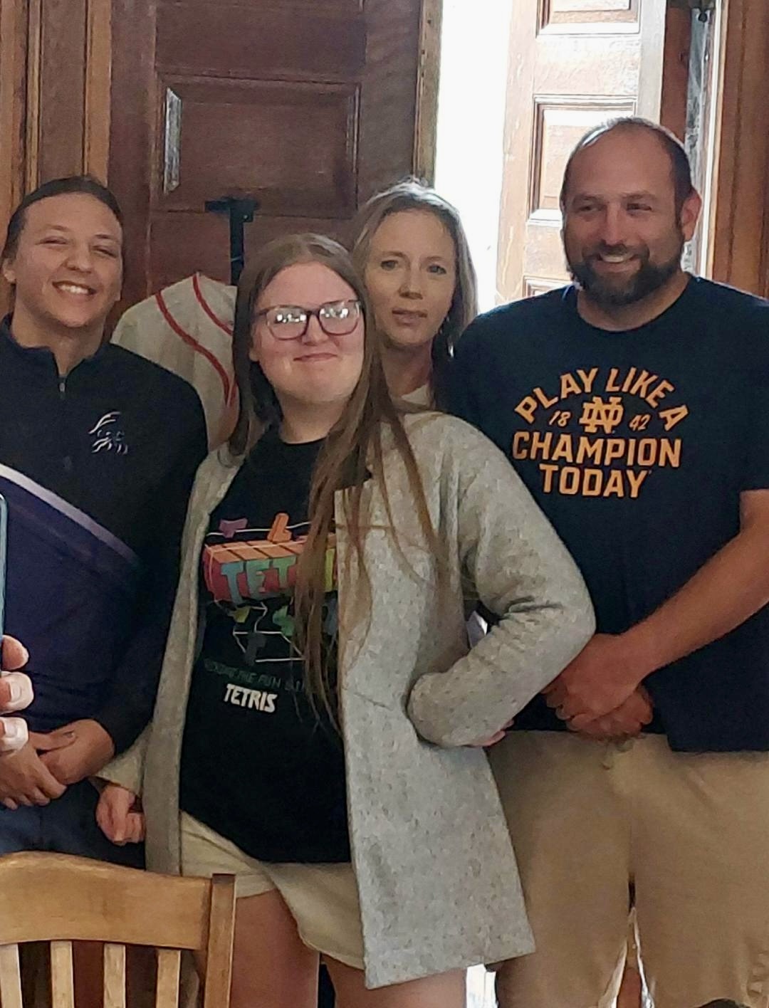Brynn with father Bryan, mother Sarah, and sister Bailey