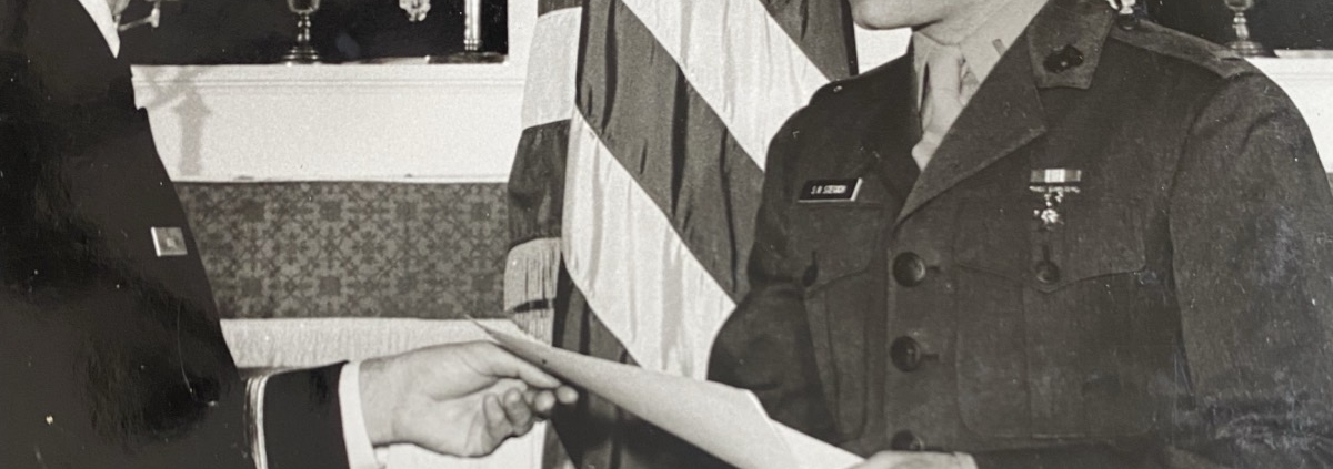 Captain Stephen R. Stegich, III, USMC (Ret) accepting award