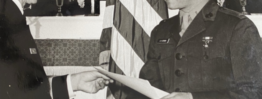 Captain Stephen R. Stegich, III, USMC (Ret) accepting award